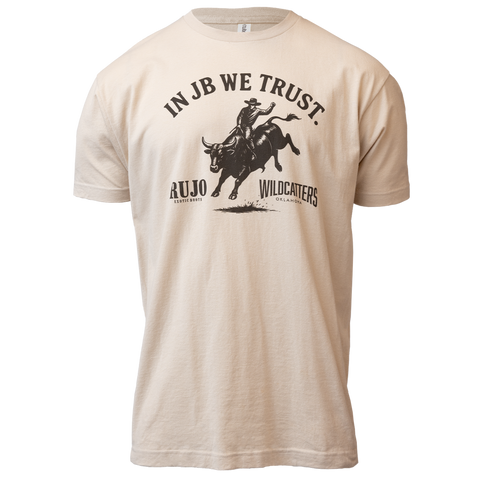 Sand tee with graphic of bull rider with text "IN JB WE TRUST RUJO WILDCATTERS"